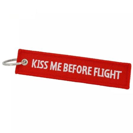 Schlüsselanhänger KISS ME BEFORE FLIGHT rot