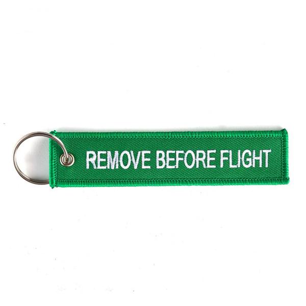 Schlüsselanhänger REMOVE BEFORE FLIGHT grün