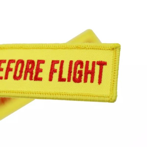 Schlüsselanhänger REMOVE BEFORE FLIGHT gelb Version 2